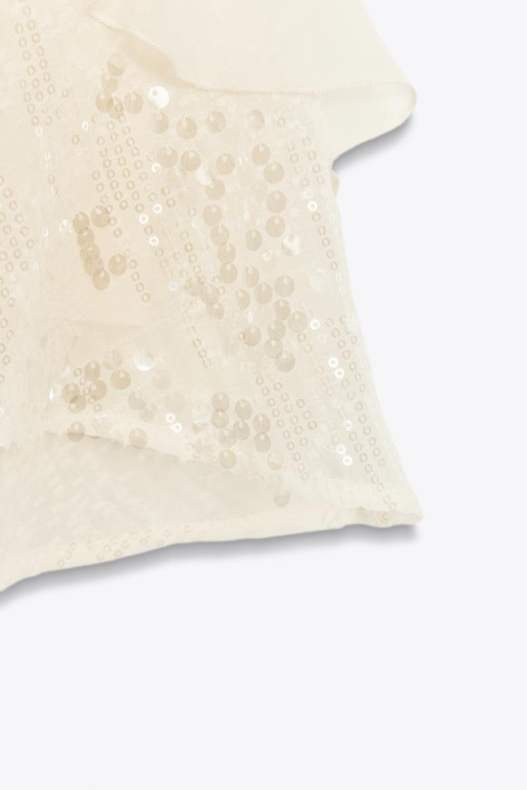 Vestido mini con volantes y lentejuelas